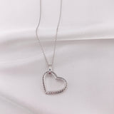 10K White Gold CZ Dangling Heart Necklace