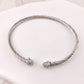 CZ Classic Twist Bangle by Miss Mimi