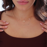 10K Gold Sideways Cross Necklace with CZ