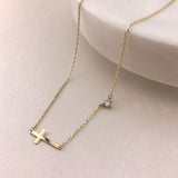 10K Gold Sideways Cross Necklace with CZ
