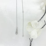 10K White Gold CZ Dangling Heart Necklace